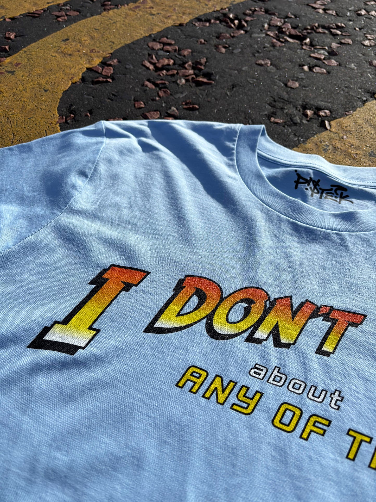 I Don't Care About Any Of This | Parody Graphic T-Shirt